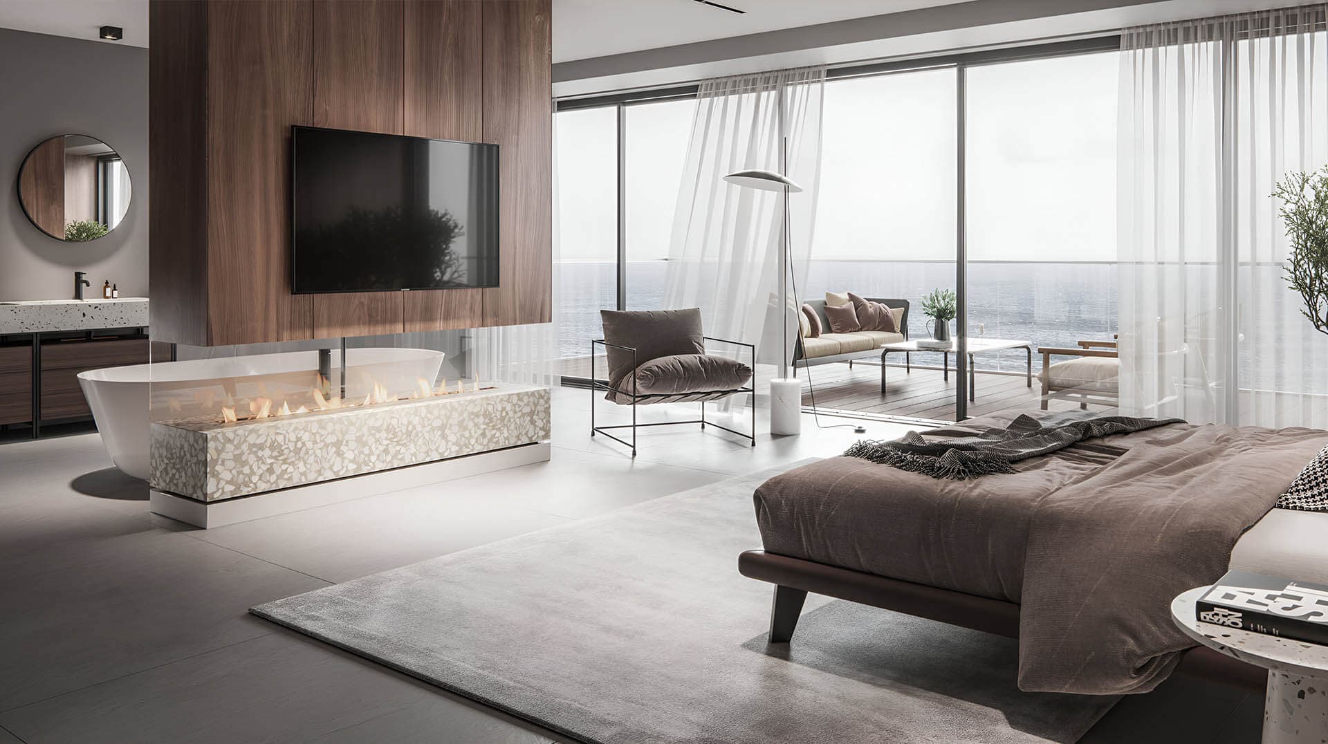 Calm bedroom with a fireplace, a freestanding bath and a view